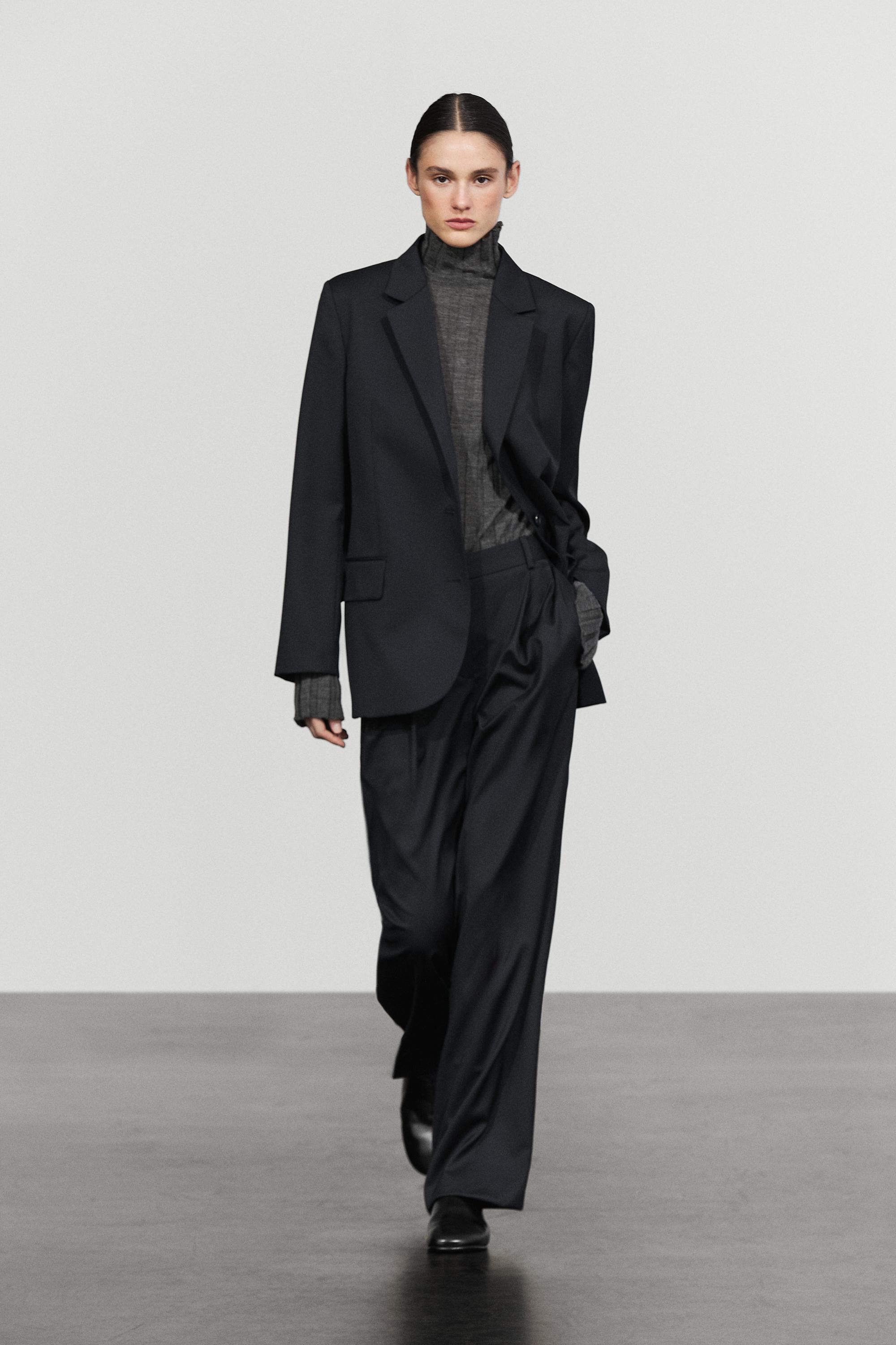 Pleated extra fine wool trousers
